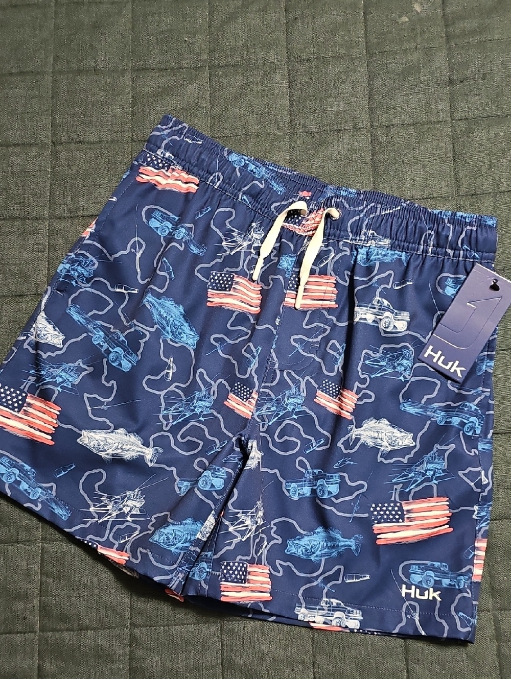 Huk Navy Swim Shorts with Red, White & Light Blue Flag and Fish Print